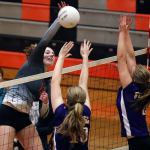 Monroe&rsquo;s Samantha Zimmerman attempts a kill with Lake Stevens&rsquo; Anna Saack (left) and Lilly Eason blocking during the Bearcats&rsquo; five-set loss to the Vikings on Thursday in Monroe. (Kevin Clark / The Herald)