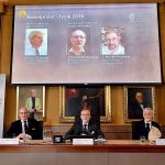 The Royal Academy of Sciences members, from left, Professor Nils Martensson, Professor Goran K Hansson and Professor Thomas Hans Hansson reveal the winners of the Nobel Prize in physics, at the Royal Swedish Academy of Sciences, in Stockholm, Sweden, on Tuesday. (Anders Wiklund /TT via AP)