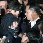 Choi Soon-sil, center left, is surrounded by prosecutor&rsquo;s officers and media upon her arrival at the Seoul Central District Prosecutors&rsquo; Office in Seoul, South Korea, on Monday, Oct. 31. South Korea is hoping for answers Monday about its biggest scandal in years. At the center is Choi Soon-sil. Media speculation claims that Choi, who has no official ties to the administration, may have had a major role in government affairs by pulling strings from the shadows while exploiting her relationship with Park for money and favors. (AP Photo/Lee Jin-man)