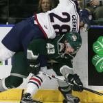 Everett&rsquo;s Connor Dewar ducks a block attempt by Tri City&rsquo;s Morgan Geekie in the first period of play Wednesday night at Xfinity Arena in Everett. (Kevin Clark / The Herald)