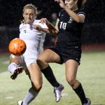 Lake Stevens&rsquo; Lexi Ramirez, left, and Kamiak&rsquo;s Jamie Beirne vie for control of the ball Thursday night at Lake Stevens High School on October 13, 2016.(Kevin Clark / The Herald)