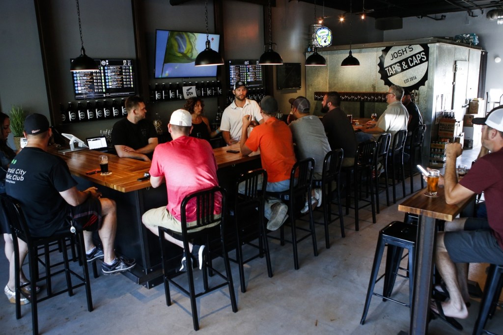Patrons fill the bar Aug. 5. (Ian Terry / The Herald)