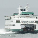 A Washington State ferry makes its way through waves to Edmonds on Friday, Oct. 14. High winds put the Edmonds-Kingston ferry behind schedule on Friday afternoon. (Ian Terry / The Herald)