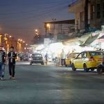 This image made from video posted online on Monday, Oct. 17, by Amaq News Agency of the Islamic State militant group shows a street scene in Mosul, Iraq. (militant video, Amaq News Agency via AP)