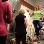 Kim Karrick explains the distilling progress during the Giniology class at Scratch Distillery Saturday night in Edmonds on April 17, 2016. (Kevin Clark / The Herald)