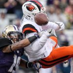 Oregon State&rsquo;s Devin Chappell breaks up a pass intended for Washington&rsquo;s Andre Baccellia Saturday afternoon at Husky Stadium in Seattle. (Kevin Clark / The Herald)
