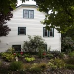 Located at Rainier Street and 26th Street in Everett, Roxanne and Paul Wright&rsquo;s rain garden runs alongside the sidewalk. (Ian Terry / The Herald)