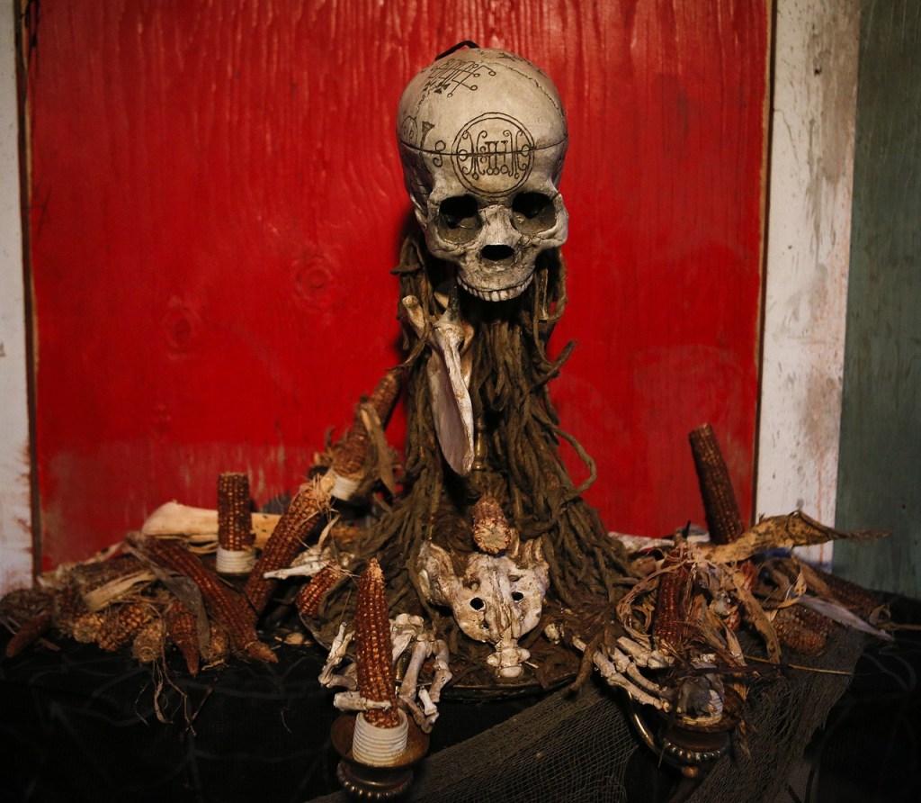 Rotting corn sits on a mantle near the entrance to a haunt at Stalker Farms in Snohomish. This year&rsquo;s &ldquo;The Harvest&rdquo; tells the story of a corn-worshipping cult as visitors make their way through the haunt. (Ian Terry / The Herald)