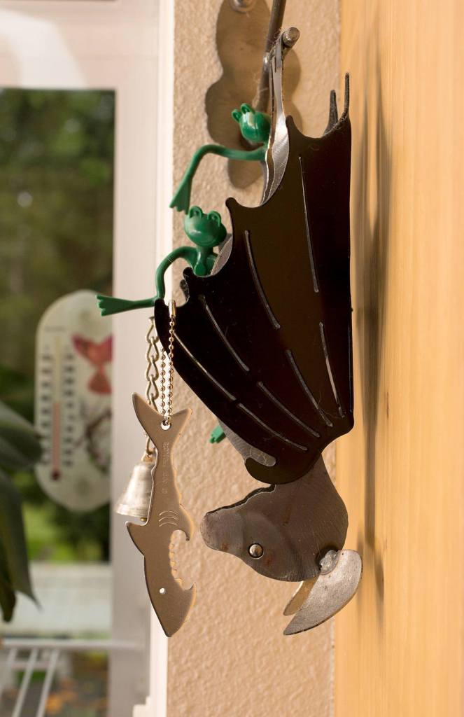 A metallic key holder in the shape of a fruit bat hangs in the Ogaard&rsquo;s kitchen. (Andy Bronson / The Herald)