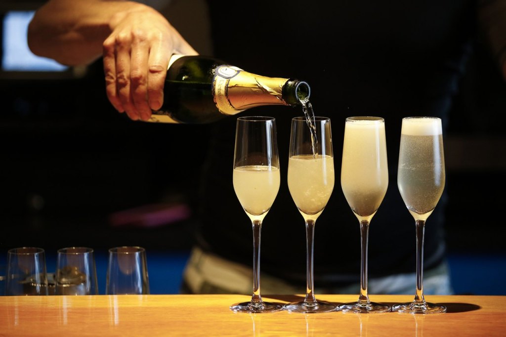 After a YogaMosa class at Bluewater Organic Distilling in Everett, drinks are made for the participants. (Ian Terry / The Herald)