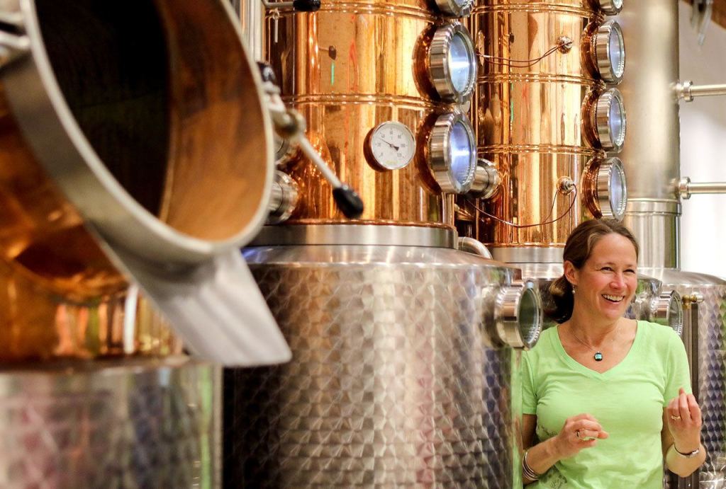 Kim Karrick explains the distilling progress during the Giniology class at Scratch Distillery Saturday night in Edmonds on April 17, 2016. (Kevin Clark / The Herald)
