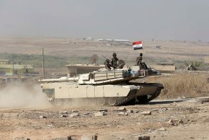 Iraqi forces are deployed during an offensive to retake Mosul from Islamic State militants outside Mosul, Iraq, onMonday. (Khalid Mohammed / Associated Press)