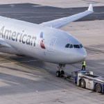 Martin Leissl / Bloomberg                                An American Airlines passenger jet is serviced at Frankfurt Airport in Frankfurt, Germany, in 2015.