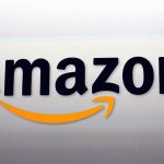 Amazon.com will add about 120,000 seasonal workers in an effort to meet an expected spike in demand during the holidays. (AP Photo/Reed Saxon, File)