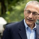 In this Oct. 5 photo, Hillary Clinton campaign chairman John Podesta speaks to members of the media outside Clinton&rsquo;s home in Washington. The WikiLeaks organization on Oct. 7, posted what it said were thousands of emails from Podesta, including some with excerpts from speeches she gave to Wall Street executives and others &mdash; speeches she has declined to release despite demands from Trump. (AP Photo/Andrew Harnik)