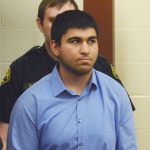 Arcan Cetin is escorted into Skagit County District Court by Skagit County&rsquo;s Sheriff&rsquo;s Deputies on Sept. 26. (Brandy Shreve/Skagit Valley Herald via AP)