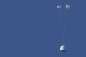 Blue Origin successfully tests escape system, lands rocket