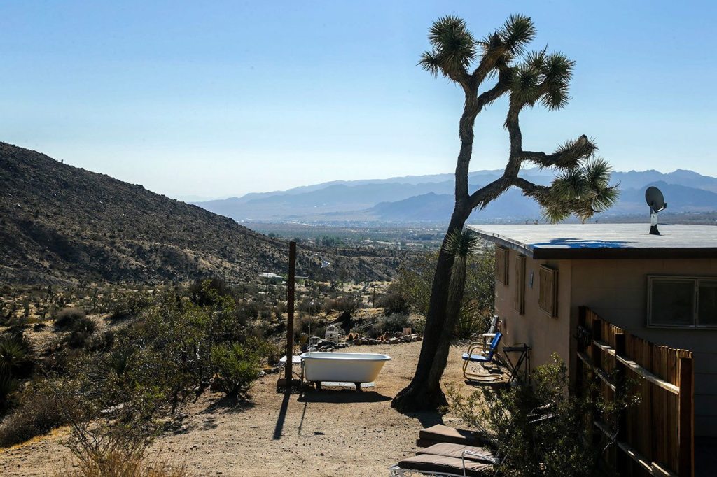 Outdoor tub and shower at a vacation owned by Anne Krieghoff in Yucca Valley. Anne and her husband Darryl Krieghoff bought a tiny homestead shack 1991 and renovated into a two bedroom weekend getaway in Yucca Valley. Now they are renting it out through Airbnb that is bring them a rental income on September 02, 2016. (Irfan Khan / Los Angeles Times/TNS)
