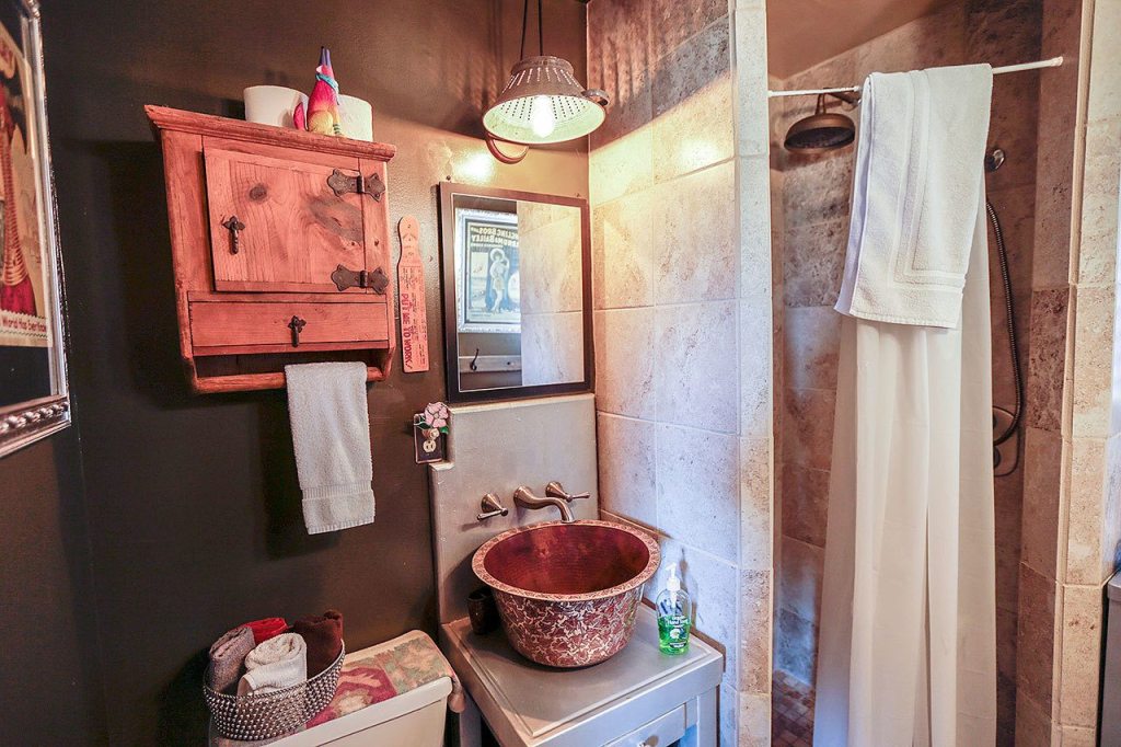 Anne Krieghoff and her husband Darryl bought a tiny homestead shack 1991 and renovated into a two bedroom weekend getaway in Yucca Valley. Now they are renting it out through Airbnb that is bring them a rental income on September 02, 2016. (Irfan Khan / Los Angeles Times/TNS)