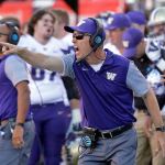 Washington head coach Chris Petersen shouts to his team in the second half of a game against Utah on Oct. 29 in Salt Lake City. Washington won 31-24. (AP Photo/Rick Bowmer)
