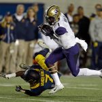 Washington&rsquo;s John Ross (1) makes a reception over California&rsquo;s Khari Vanderbilt (7) during the first quarter of a game Nov. 5 in Berkeley, Calif. (AP Photo/Ben Margot)