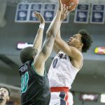 Gonzaga&rsquo;s Silas Melson (0) rises to shoot as Utah Valley&rsquo;s Jordan Poydras defends during the Bulldogs&rsquo; 92-69 win over the Wolverines on Friday in Spokane. (AP Photo/Young Kwak)