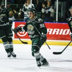 Silvertips left wing Dominic Zwerger (center) celebrates a goal with teammates Riley Sutter (left) and Matt Fonteyne (right) during the first period of Everett&rsquo;s 6-1 win over Calgary on Tuesday at Xfinity Arena in Everett. (Ian Terry / The Herald)