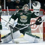 Silvertips goalie Carter Hart makes a glove save during during Everett&rsquo;s 6-1 win over Calgary on Tuesday at Xfinity Arena in Everett. (Ian Terry / The Herald)