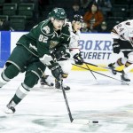 Silvertips right wing Eetu Tuulola (82) brings the puck up the ice during Everett&rsquo;s 6-1 win over Calgary on Tuesday at Xfinity Arena in Everett. (Ian Terry / The Herald)