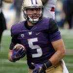 Washington&rsquo;s Jeff Lindquist gets up after carrying the ball against Rutgers during a game on Sept. 3 in Seattle. (AP Photo/Elaine Thompson)