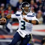 Seahawks quarterback Russell Wilson scrambles during a game against the Patriots this past Sunday in Foxborough, Mass. (Winslow Townson/AP Images for Panini)