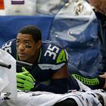 Seattle Seahawks cornerback DeShawn Shead is worked on after a play against the Philadelphia Eagles in the first half of Sunday&rsquo;s game. Shead left the game in the first half due to a hamstring injury. (AP Photo/John Froschauer)