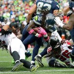 Seattle&rsquo;s Alex Collins (36) scores a touchdown against Atlanta Falcons on Oct. 16 in Seattle. Collins will get more opportunities in the Seahawks&rsquo; backfield with the injury to C.J. Prosise. (AP Photo/Elaine Thompson)