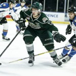 Silvertips left wing Matt Fonteyne (17) protects the puck from Kootenay&rsquo;s Zak Zborosky (22) during a game Wednesday at Xfinity Arena in Everett. (Ian Terry / The Herald)