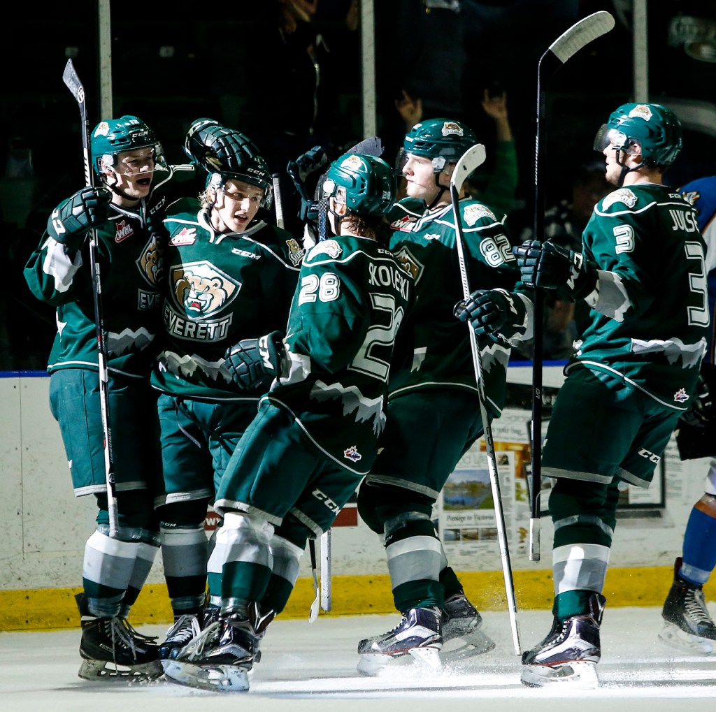 Everett&rsquo;s Bradly Goethals (left) is congratulated by teammates (from left) Orrin Centazzo, Devon Skoleski, Eetu Tuulola and Noah Juulsen after he scored in the second period of a game against Kootenay on Wednesday at Xfinity Arena in Everett. (Ian Terry / The Herald)