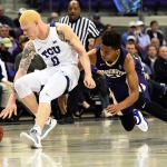 TCU&rsquo;s Jalen Fisher (left) scrambles for a loose basketball against Washington&rsquo;s Markelle Fultz during the first half of a game Wednesday in Fort Worth, Texas. (Bob Haynes/Star-Telegram via AP)