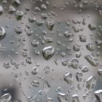 The historic Longfellow building at 3715 Oakes Ave. is reflected in raindrops on Monday in Everett. The building will be razed for a parking lot by the end of next summer. (Andy Bronson / The Herald)