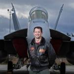Cascade High School graduate Commander Todd Zentner stands in front of an EA-18G &ldquo;Growler&rdquo; at Whidbey Island Naval Air Station on Wednesday. Zentner graduated from Cascade in 1993, attended the Naval Academy and now serves as the Commander of the VAQ-133 Squadron known as the Wizards. (Andy Bronson / The Herald)