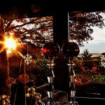 The low winter sun streaks through Larry and Linda Jubie&rsquo;s living room, catching on glass bulbs, snowflakes and other holiday gems, all within the watchful gaze of one of the family&rsquo;s many snowmen. (Dan Bates / The Herald)