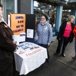 Zonta Club of Everett members (from left) Marilyn Kent, Judith Strand, Cindy Phillips and Linda Lepak chat while standing on Colby Avenue in Everett in an effort to raise awareness about violence against women on Friday. (Ian Terry / The Herald)
