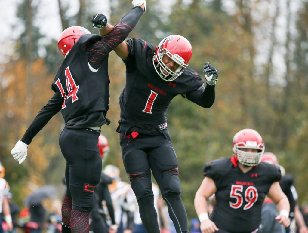 Archbishop Murphy&rsquo;s Anfernee Gurley, left, and Kyler Gordon celebrates a touchdown Saturday afternoon against Burlington-Edison at Terry Ennis Stadium on November 5, 2016. (Kevin Clark / The Herald)