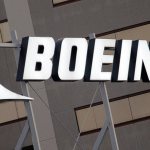 This 2011 photo shows the Boeing Company logo on the property in El Segundo, California. A World Trade Organization panel on Monday, Nov. 28, ruled that Washington state offered billions in illegal tax breaks to Boeing, saying that the U.S. government must take action to end the plans within months. (AP Photo/Reed Saxon, File)