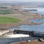 In this 2013 photo, the Ice Harbor Dam on the Snake River is seen from the air near Pasco. There is a renewed push to remove Ice Harbor and three other dams on the Snake River to save wild salmon runs. (Bob Brawday/The Tri-City Herald via AP, File)