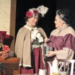 The Brewster sisters, Martha (Vicki Lynn Maxey) and Abby (Kathleen Sasnett) discuss their poisonous hobby in Red Curtain&rsquo;s production of &ldquo;Arsenic and Old Lace.&rdquo;