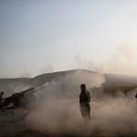 Kurdish Peshmerga soldiers fire artillery at Islamic State positions in Bashiqa, east of Mosul, Iraq, on Monday, Nov. 7. Iraqi Kurdish fighters exchanged heavy fire with IS militants early Monday as they advanced from two directions on a town held by the Islamic State group east of the city of Mosul. (AP Photo/Felipe Dana)