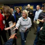 Sen. Patty Murray, D-Wash., center, shakes hands Friday, Nov. 4, before speaking to campaign volunteers and other supporters during a get-out-the-vote rally at a campaign office in Seattle. (AP Photo/Ted S. Warren)