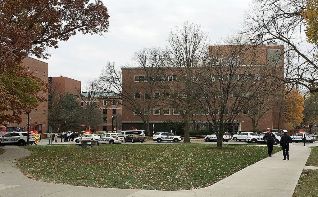 Police respond to reports of an active shooter on campus at Ohio State University on Monday, Nov. 28, in Columbus, Ohio. (AP Photo/Andrew Welsh-Huggins)