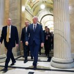 Vice president-elect Mike Pence arrives on Capitol Hill in Washington on Thursday, Nov. 17, for meeting with Hill leadership. (AP Photo/Andrew Harnik)