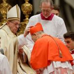 New Cardinal Mario Zenari, Apostolic Nuncio in Syria, receives the red three-cornered biretta hat during a consistory inside the St. Peter&rsquo;s Basilica at the Vatican on Saturday. (AP Photo/Gregorio Borgia)