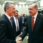 Turkey&rsquo;s President Recep Tayyip Erdogan (right) and NATO Secretary General Jens Stoltenberg shake hands as they attend a NATO parliamentary assembly meeting in Istanbul on Monday, Nov. 21. Erdogan has called on the United States and other nations to re-assess his country&rsquo;s proposal for the creation of a no-fly zone in northern Syria. (Kayhan Ozer, Presidential Press Service, Pool photo via AP)